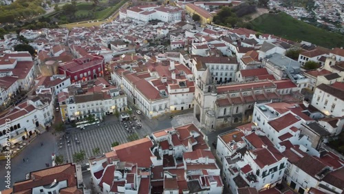 Raising drone shot over the old Town houses in Palmela, Lisbon in Portugal and sky horizon photo