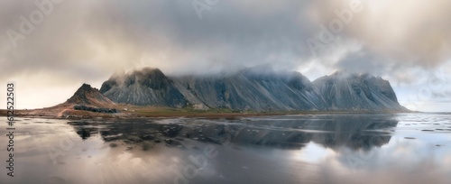 Panoramic shot of clouds over Vestrahorn Mountain in Iceland © Ahmed Alqallaf/Wirestock Creators