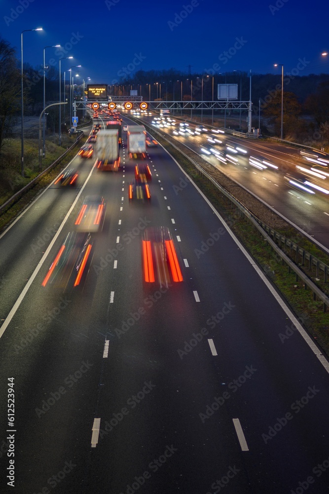 Fast moving traffic on the M42 passes through an active traffic management system during rush hour. Fast moving traffic on the M42 passes through an active traffic management system during rush hour.