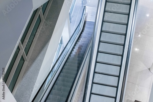 A horizontal shot from an escalator. Escalators are located and large stores and department stores
