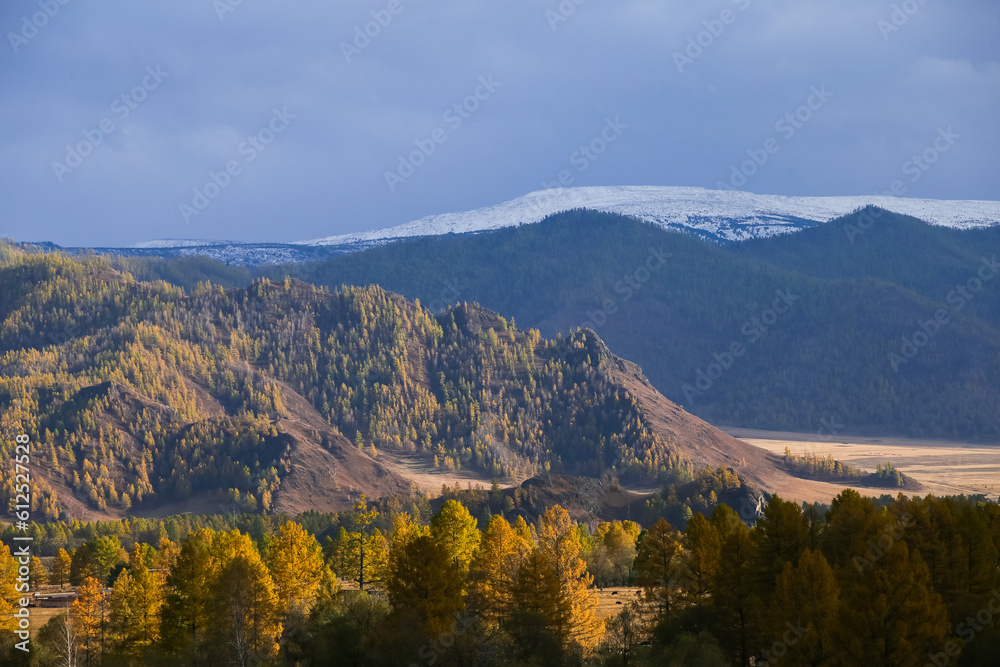 Autumn landscape with views of mountains, forest, rivers at sunrise and sunset