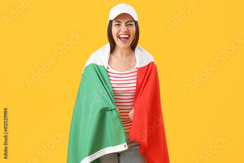 Young woman with flag of It...
