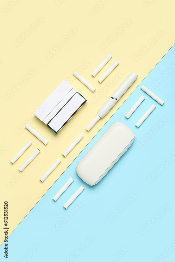 Composition with modern electronic cigar and sticks on colorful background Composition with modern electronic cigar and sticks on colorful background