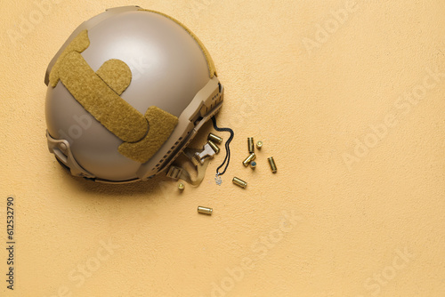 Military helmet, bullets an...