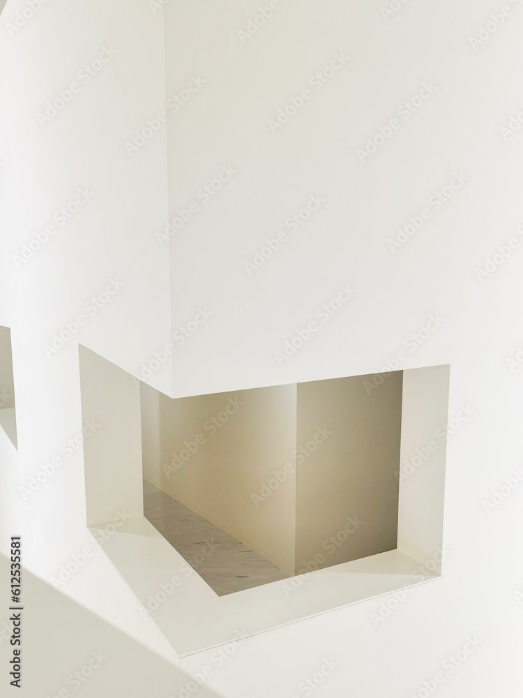 Vertical shot of the modern white interior of the Huamao Museum of Art Education in Ningbo, China Vertical shot of the modern white interior of the Huamao Museum of Art Education in Ningbo, China