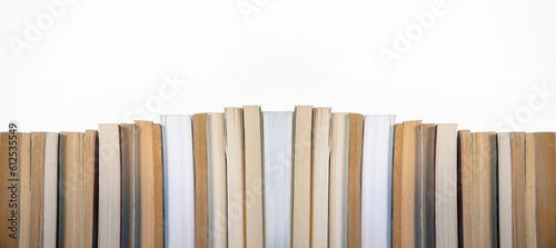 stack of books on white background.  side by side book. copy space fot text. photo