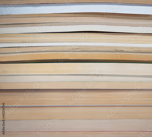 stack of books. abstract background with old books. side view.
