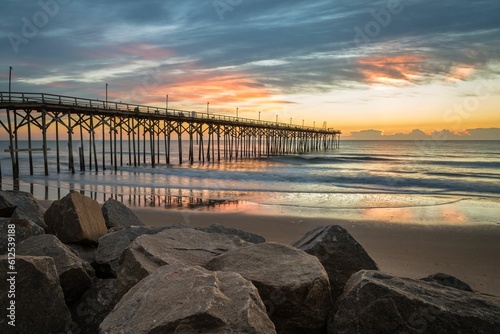 Carolina Beach Pier against scenic sunrise