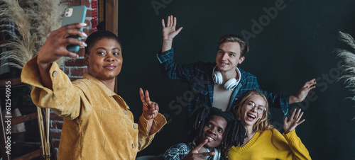 Cheerful group of diverse best friends taking selfie. Young people internation students have fun together, party, celebrate. African American, Caucasian multi cultural college university banner