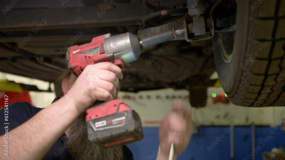 Skillful man fixing car. Car service, repair maintenance Skillful man fixing car. Car service, repair maintenance