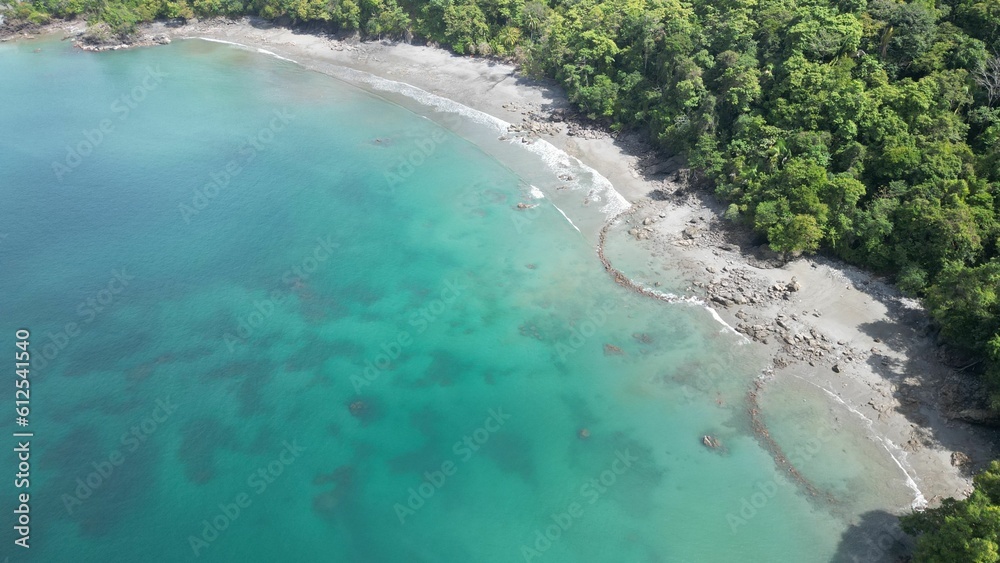 Aerial view of the sunny shore near Manuel Antonio National park in Costa Rica