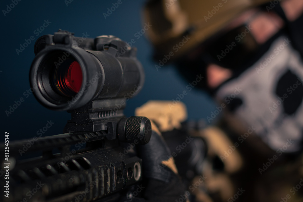soldier aiming pistol and assault rifle