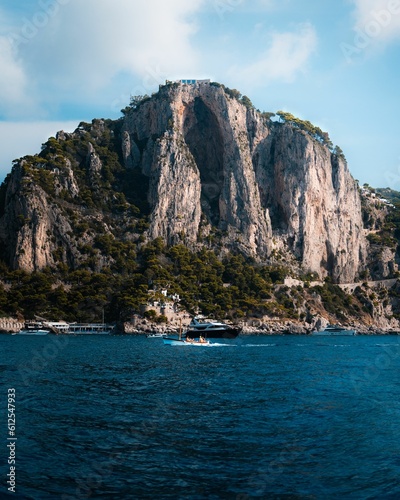 Vertical shot of the island cliffs of Capri in the Gulf of Naples, Italy
