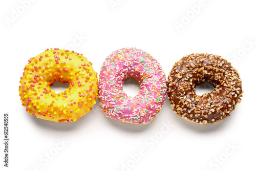 Three colorful glazed donut...