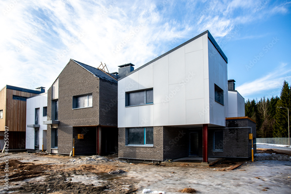 Modern barn house with a stylish exterior and facade. Concept of an eco-friendly house. Scandinavian style Barnhouse in the woods Modern barn house with a stylish exterior and facade. Concept of an eco-friendly house. Scandinavian style Barnhouse in the woods
