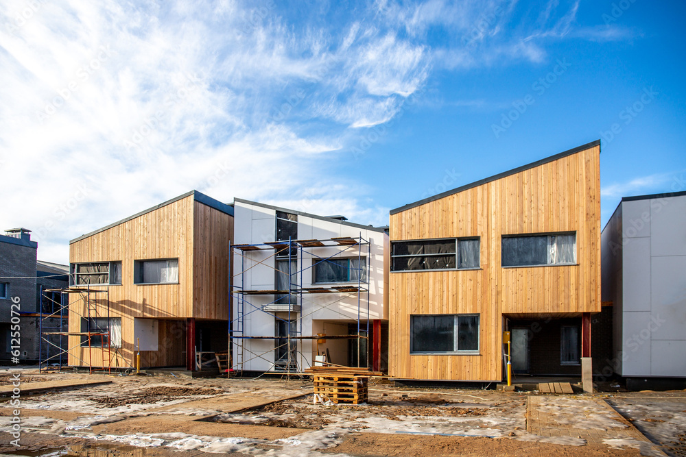 Modern barn house with a stylish exterior and facade. Concept of an eco-friendly house. Scandinavian style Barnhouse in the woods Modern barn house with a stylish exterior and facade. Concept of an eco-friendly house. Scandinavian style Barnhouse in the woods