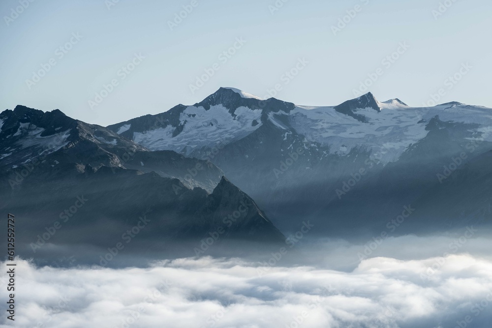 Aerial view of snow covered mountain landscape