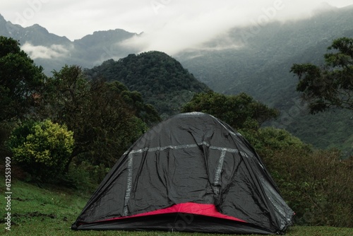 Camping tent against the mountains in Farallones de Cali, Colombia