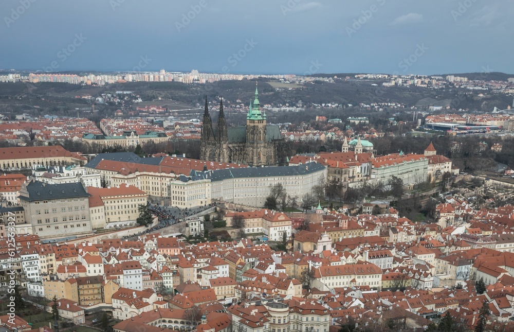 The cityscape of Prague, Czech Republic, on a cloudy day, with the Prague Castle in the background