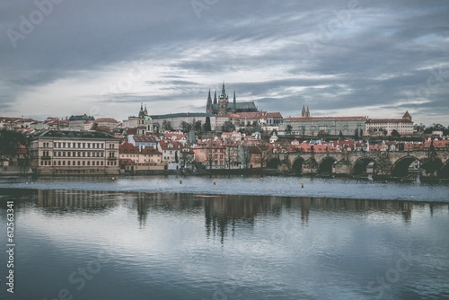 The cityscape of Prague, Czech Republic, on a cloudy winter day, with the Vltava River coast