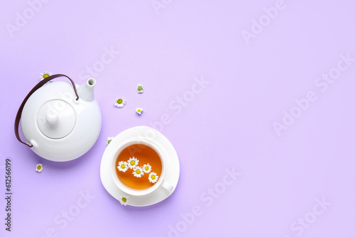 White ceramic teapot and te...