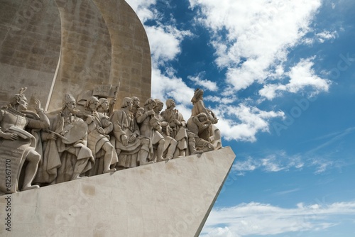 Closeup of the stone sculpture Padrao dos Descobrimentos against a cloudy sky photo