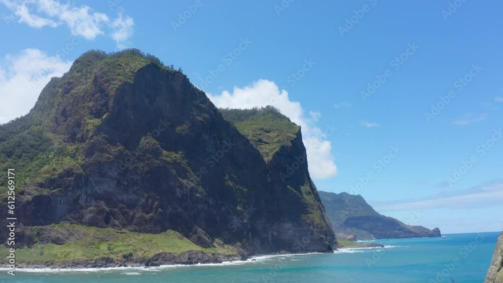Aerial view of greenery Madeira island surrounded by water Aerial view of greenery Madeira island surrounded by water