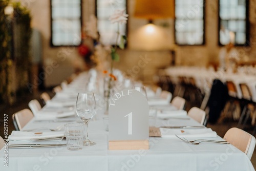 Принти на полотні Beautiful shot of a dinner table with floral decorations at a wedding venue