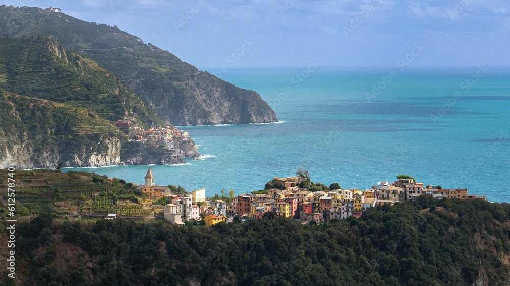Aerial view of modern buildings near the sea in Cinque Terre, Italy