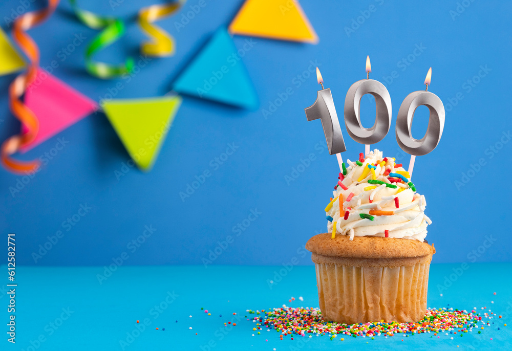 Birthday cake with candle number 100 - Blue background