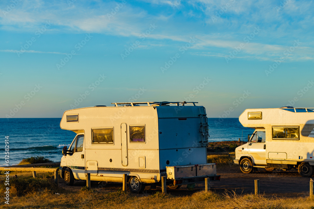 Camper rv camping on sea shore, Spain Camper rv camping on sea shore, Spain