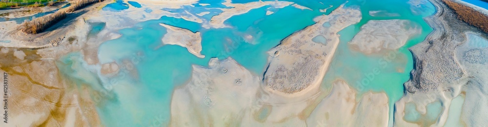 Aerial view of a stunning seascape with emerald green sea in Forggensee reservoir, Allgau