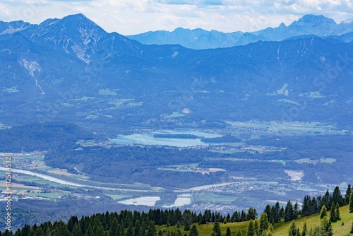 Beautiful landscape over Lake Faak surrounded by the Gerlitzen Alps in Austria