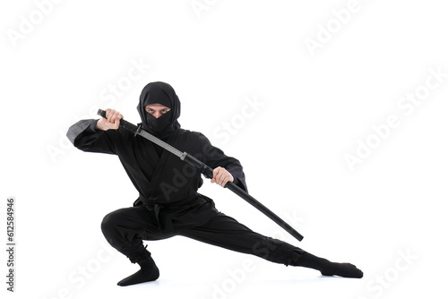 Male ninja with sword on white background