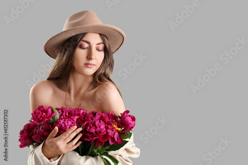 Beautiful young woman with ...