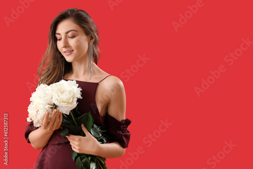 Beautiful young woman with ...