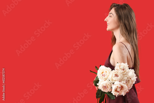 Beautiful young woman with ...