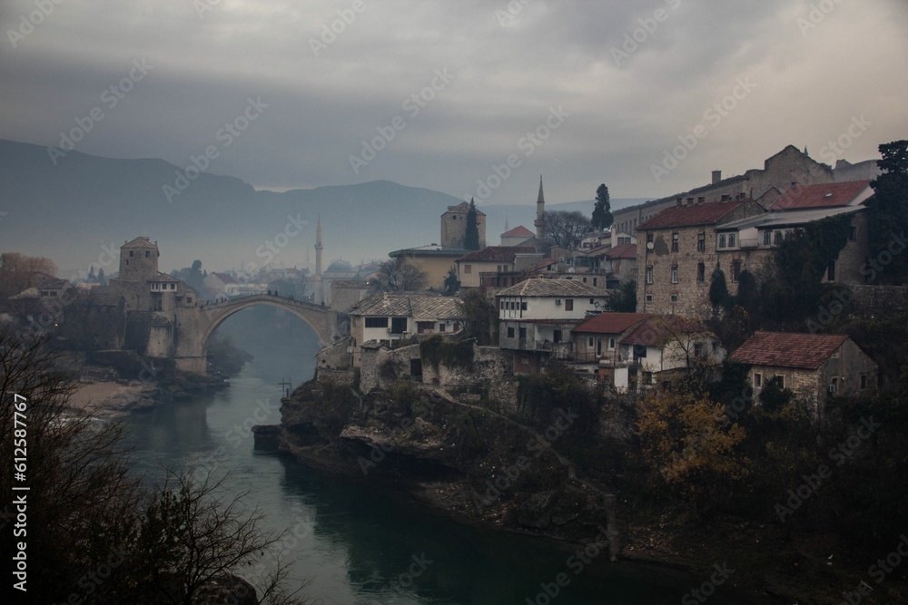 High-angle of Mostar old bridge on a gloomy day High-angle of Mostar old bridge on a gloomy day
