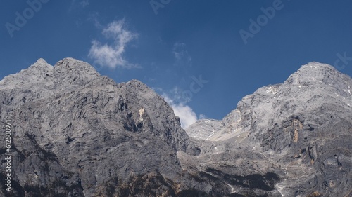Landscape view of the rocky mountains against a blue sky
