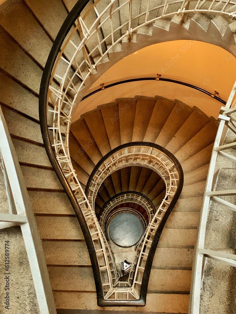 Fototapeta premium Vertical shot of indoor staircase in Prague, Czech Republic