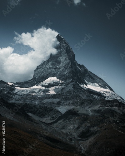 Vertical shot of the Matterhorn, a mountain of the Alps on the border between Switzerland and Italy.