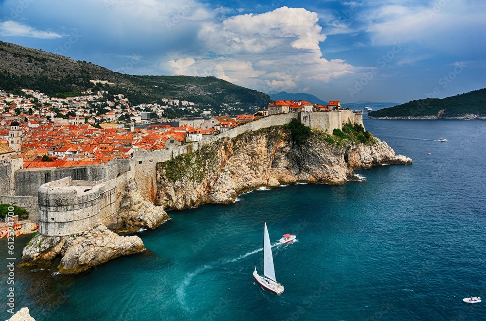 Drone shot of city walls and houses of Dubrovnik in Croatia on the coast of the Adriatic sea