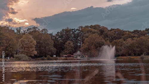 Chemnitz lake, movingclouds over Castle Park with fountain, photo