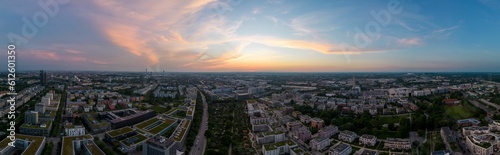 Drone panoramic view of sunset cloudy sky over Munich cityscape