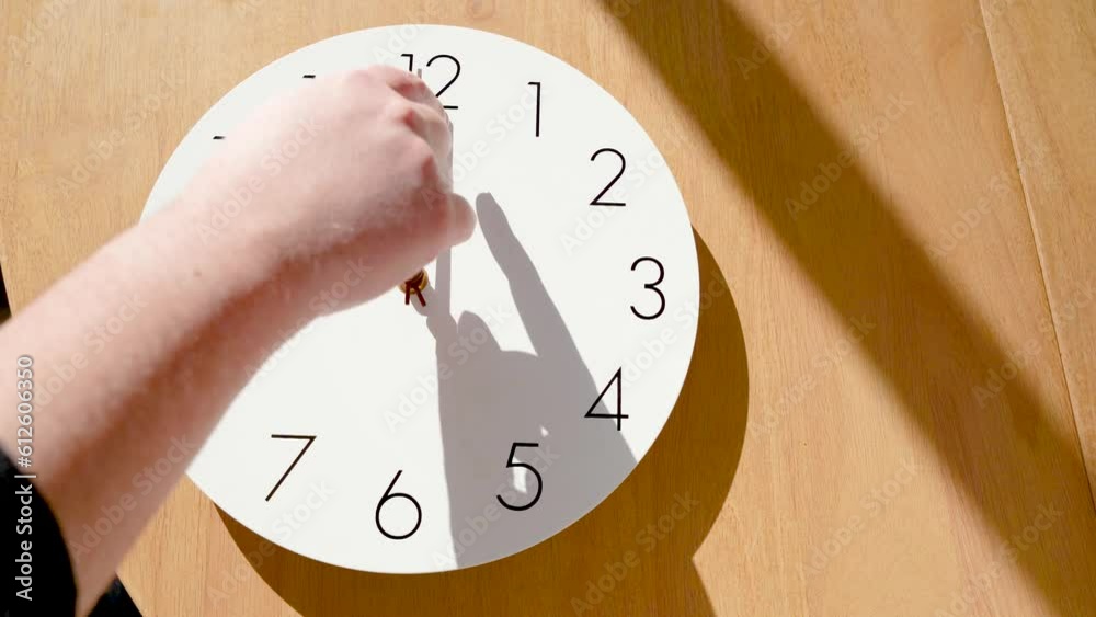 Daylight savings clock with hand moving from standard time change DST CST CDT
