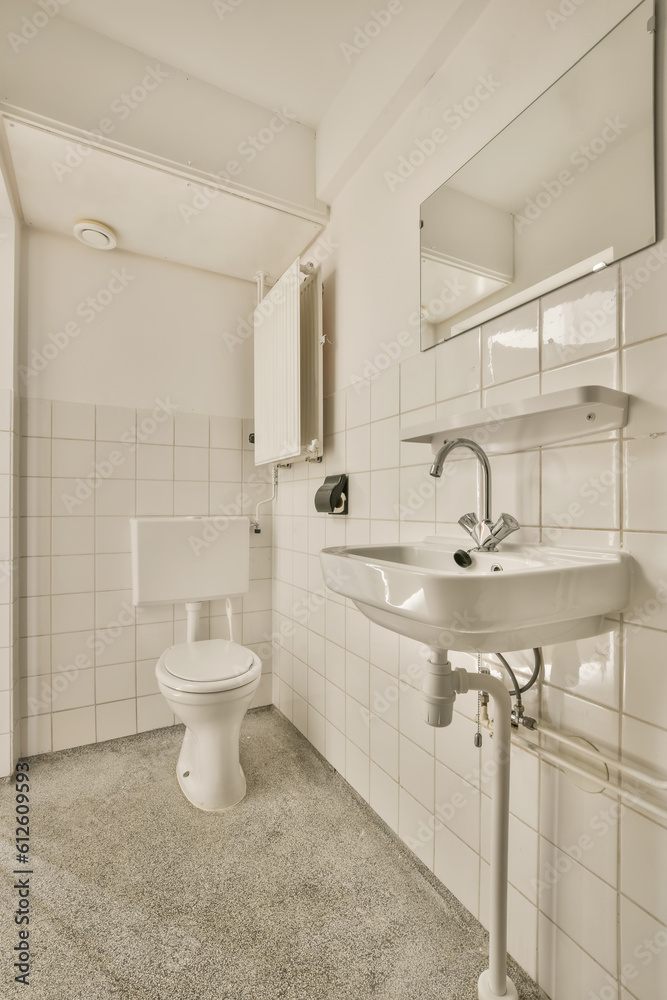 a bathroom with a sink, mirror and toilet paper dispensed on the wall next to the url a bathroom with a sink, mirror and toilet paper dispensed on the wall next to the url