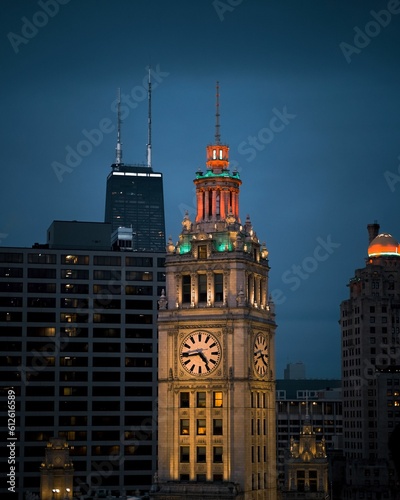 Vertical shot of the Wrigley building in Chicago, Illinois, at night photo