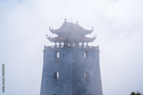 Pagoda at the top of mount Fanispan, Sapa region, Lao Cai, Vietnam. The Grand belfry - Vong Linh Cao Dai is the guard tower on the main axis of Bich Van Zen Monastery. photo