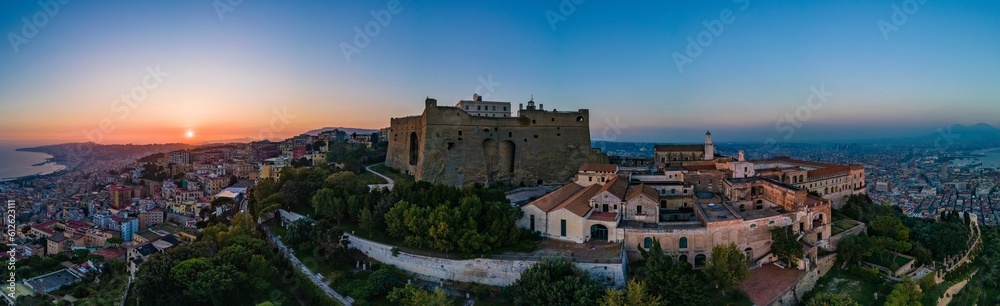Panorama of the great castle with a sunset on the horizon