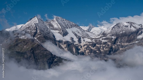 High-angle of snowy peaks of Grossglockner mountain on a sunny day, Austria